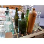 A collection of vintage glass bottles, together with a Dutch 3/4 litre stoneware bottle marked '