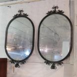 A pair of wrought iron mirrors, 112x64cm