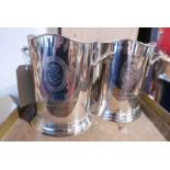 A pair of chrome plated wine coolers