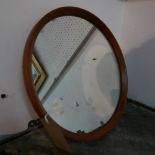 A mid 20th century circular teak wall mirror, Diameter 38cm