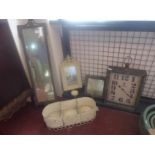 Three metal garden mirrors, together with a rectangular clock with Arabic dial marked London, 43 x