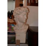 A cast plaster bust of David, H.60cm