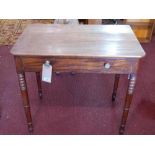 A 19th Century mahogany side table, with single frieze drawer raised on turned supports, H.74cm W.