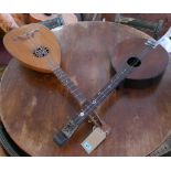 An early 20th Century lute and another similar instrument (2)