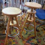 A pair of pine adjustable artists' sculpture stools, approx H.70cm (2)