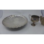 A tennis winners' silver cup, H.12cm, together with a silver plate scalopped form dish (2)