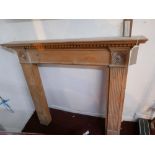 A 20th century pine fire surround, 111x123cm