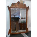 A 19th century elm fret work mirror, with later bevelled plate, 74x52cm