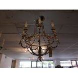 A contemporary ten branch silvered chandelier, with stylised leaf and floral decoration, H.80cm