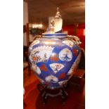 A large Japanese blue glazed and enamelled lidded vase on stand, with gilt metal mounts, H.70cm