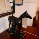 A contemporary composite table lamp in the form of a horse, H.50cm