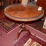 A Georgian mahogany circular tilt top table, with pierced gallery top, H.70 Diameter.74cm