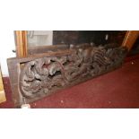 A late 19th century carved oak frieze, 38cm x 157cm