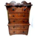 A 19th century mahogany apprentice piece chest, with five drawers and bearing plaque for W.