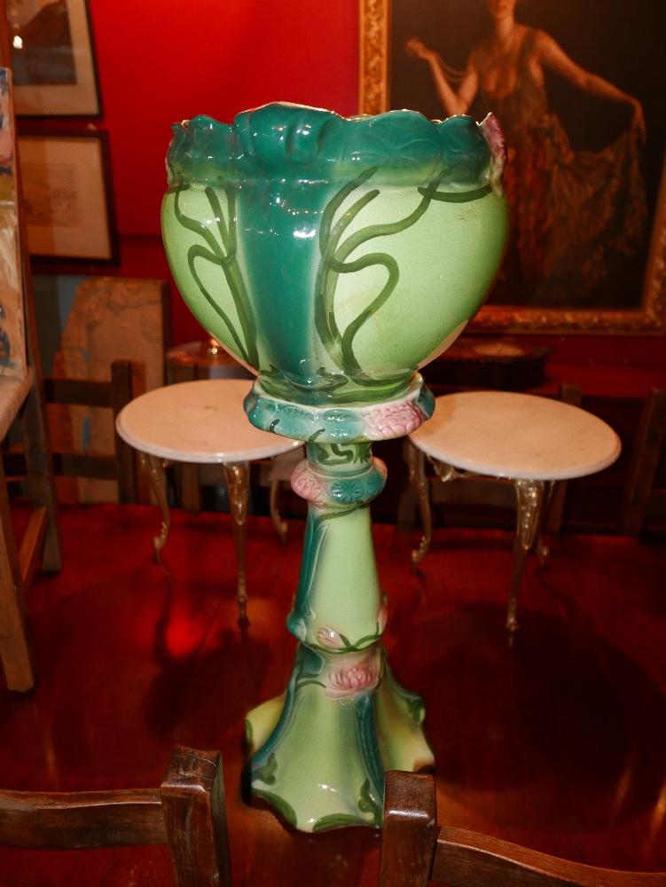 WITHDRAWN - An early 20th Century Art Nouveau green glazed ceramic jardinere on stand, H.88cm