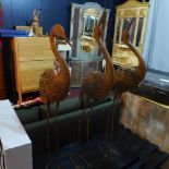 A set of three garden cranes in a weathered finish, (3)