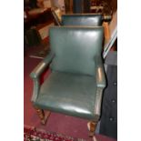 A pair of Howard & sons oak Gainsborough armchairs, green leather upholstery and makers stamp