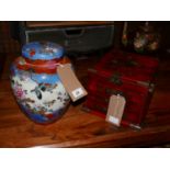 A Japanese blue glazed and enamelled lidded temple jar, together with an Oriental vanity case (2)