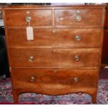 A 19th century mahogany chest of two short over three long drawers, raised on bracket feet, H.105