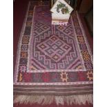 A Kelim carpet with double diamond medallion and geometric border, 220x118cm