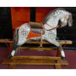 A vintage carved rocking horse