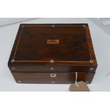 A Victorian rosewood jewellery box, with boxwood and mother of pearl inlay, H.11 W.25 D.19cm