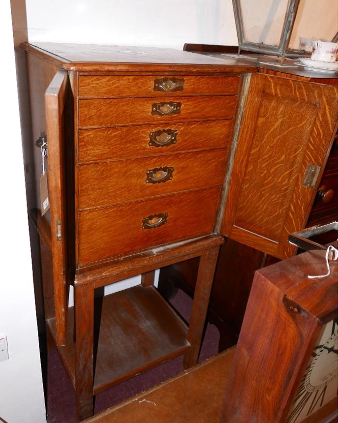 A Zachariah Barraclough & Sons oak shipping canteen, with two doors enclosing five graduating