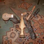 An oversized corkscrew with rustic branch handle, together with an acorn ashtray, vintage scythe and