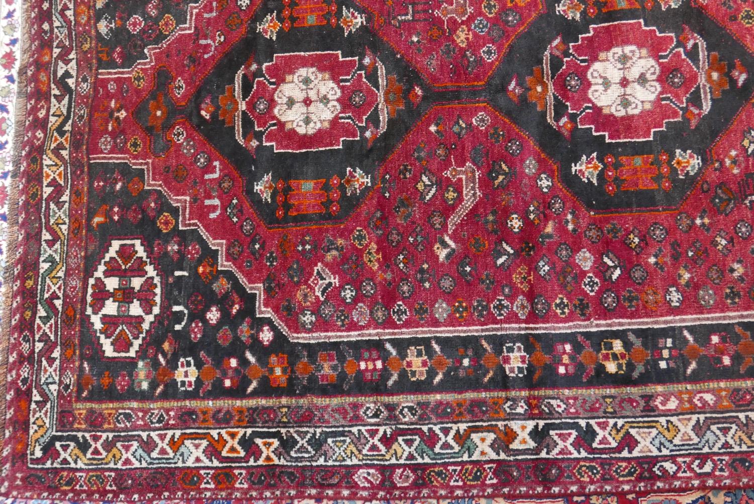 A South West Persian Qashgai carpet, 274cm X 170cm. Triple pole medallion with repeating animal - Image 3 of 3