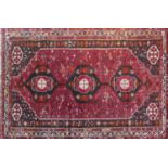 A South West Persian Qashgai carpet, 274cm X 170cm. Triple pole medallion with repeating animal