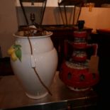 A large Italian ceramic vase form table lamp with lemons, together with a twin handled orange glazed