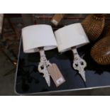 A pair of painted metal sconces, with ivory white Oka shades, H.34cm (2)