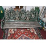 A green painted cast aluminium garden bench, H.84 W.123 D.62cm