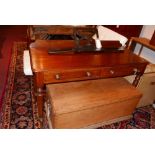 A Victorian mahogany two drawer writing table, raised on turned legs, H.80 W.120 D.52cm