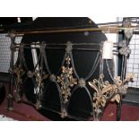 An early 19th century Maltese iron and brass four poster bed