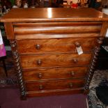 A late 19th Century Scottish mahogany chest of five drawers flanked by turned barley twist column