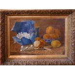 A 20th Century school oil on canvas of a still life with oranges, signed and dated 1900 lower right,