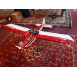 A remote control petrol powered aeroplane , L.120cm W.160cm