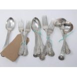 A collection of silver flatware, to include four fiddle, thread and shell pattern forks, James