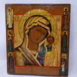 A Russian icon, Mother of God of Kazan, flanked by angels and saints to the polya, tempera on wood
