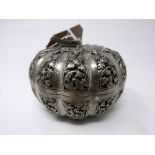 A Continental silver box in the form of a pumpkin, with floral design and stamped 800