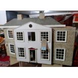 A Georgian style doll's house, H.66cm W.95cm D.38cm