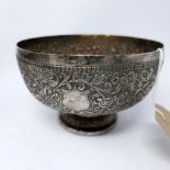 A 19th century white metal footed bowl, with engraved floral decoration, unmarked, 10oz