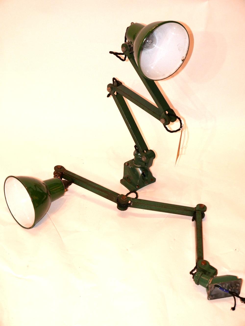 A pair of mid century green painted industrial machinist adjustable lamps, by EDL Lighting ltd.,