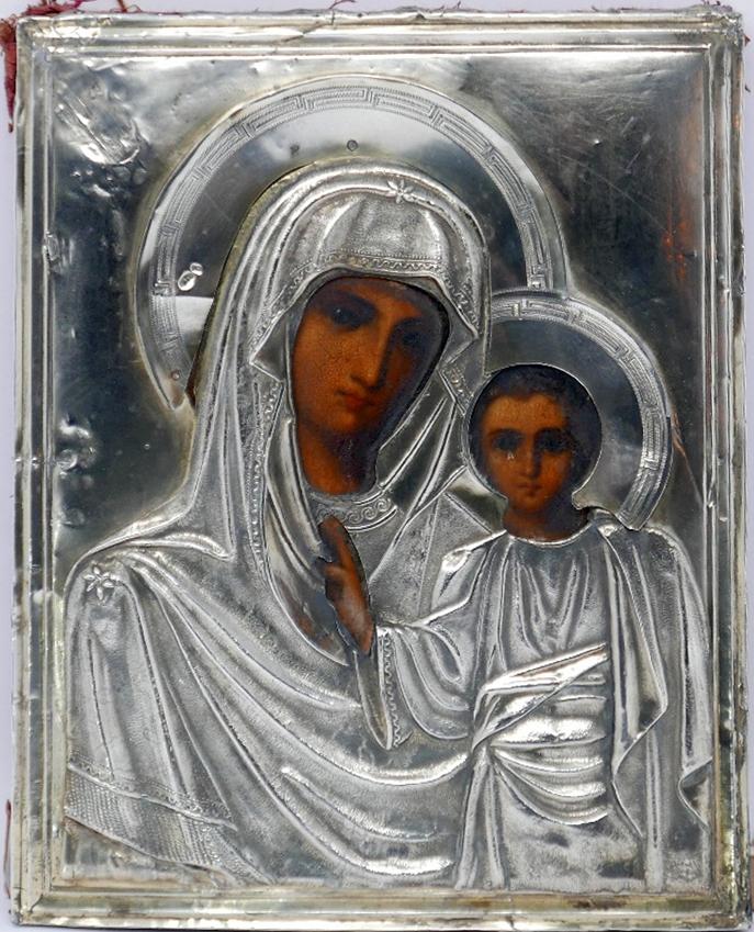 A Russian icon, Mother of God of Kazan, with silver oklad, bears hallmarks, 23 x 18cm