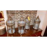 A set of four gilt metal storm lanterns, H.44cm (2)