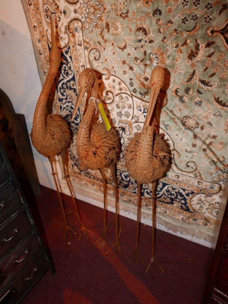 A set of three weathered garden cranes, H.105cm (3)