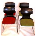 A set of four contemporary stacking dining chairs, with coloured seats over tubular metal bases, H.