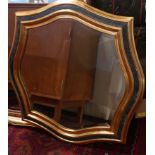 A contemporary gilt and black mirror with bevelled plate, 76 x 76cm