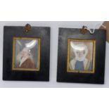 A pair of 19th century miniature portraits on paper in ebonized frames